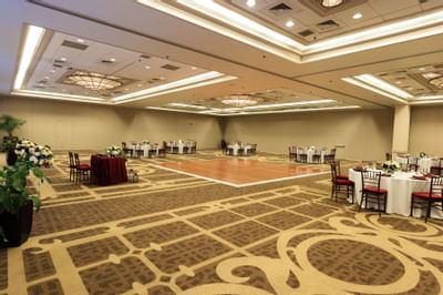 ballroom with tables and dance floor