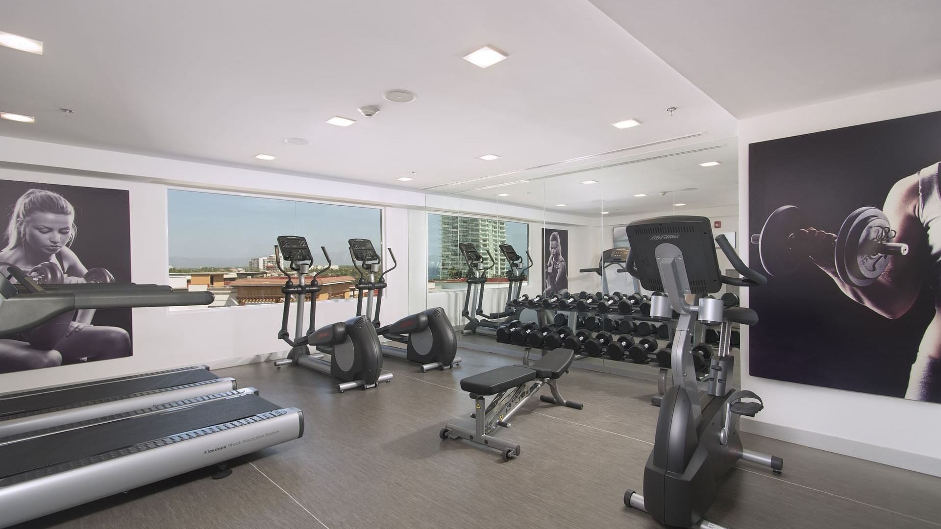 Gym area with equipment at Fiesta Inn Puerto Vallarta Isla