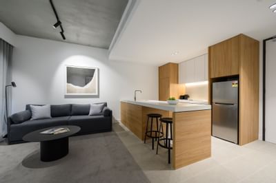 Living area with a comfy sofa in One Bedroom Apartment at Nesuto Docklands