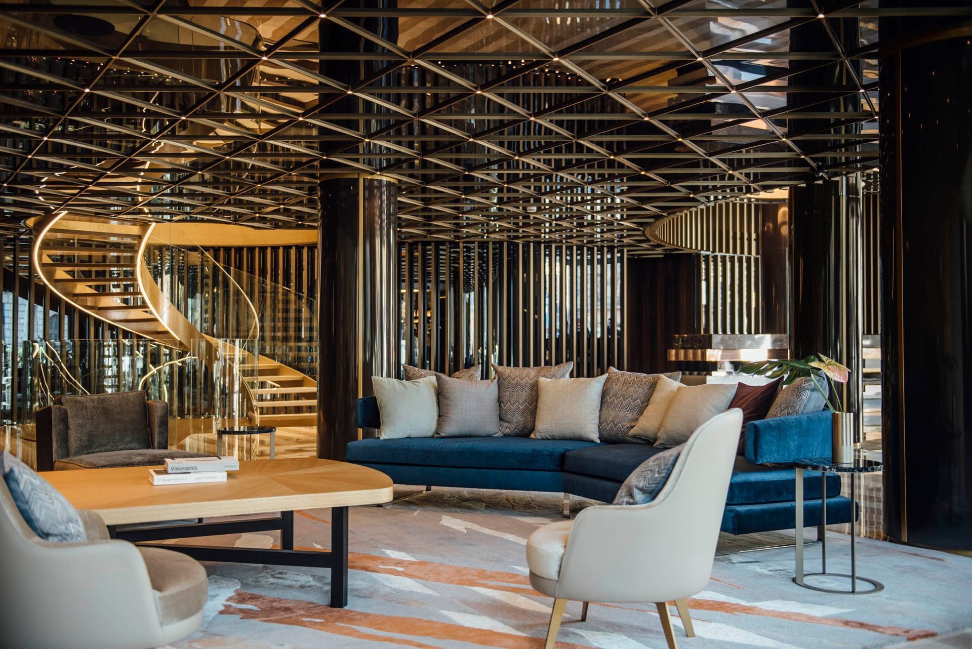 Lobby sitting area arranged in boutique hotel lobby at Almanac Barcelona