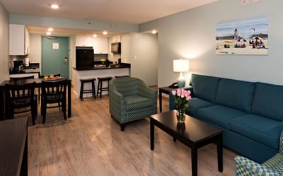 Kitchenette by the living area with wooden floors in Bay View Suite at Park Place Hotel Ocean City