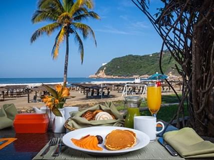 Breakfast table at La Terraza Restaurant in Mundo Imperial