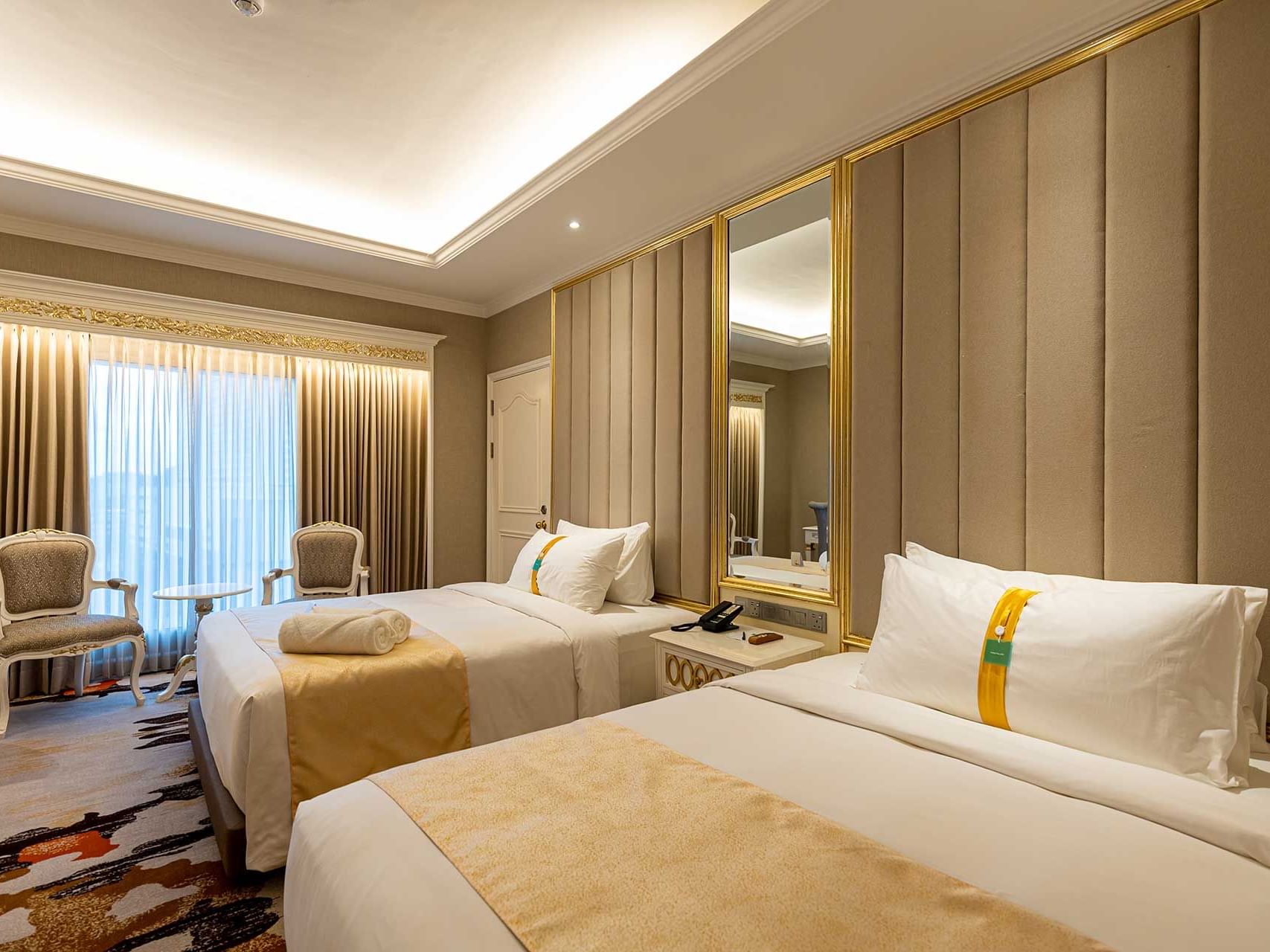 Two Beds with nightstand in Deluxe Twin at Riverside Majestic Hotel Puteri Wing