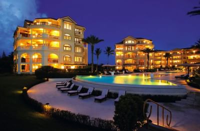 Night view of the pool and the hotel at Somerset On Grace Bay