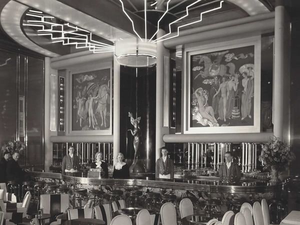 Black & white historical photo of Gold Room at Congress Plaza