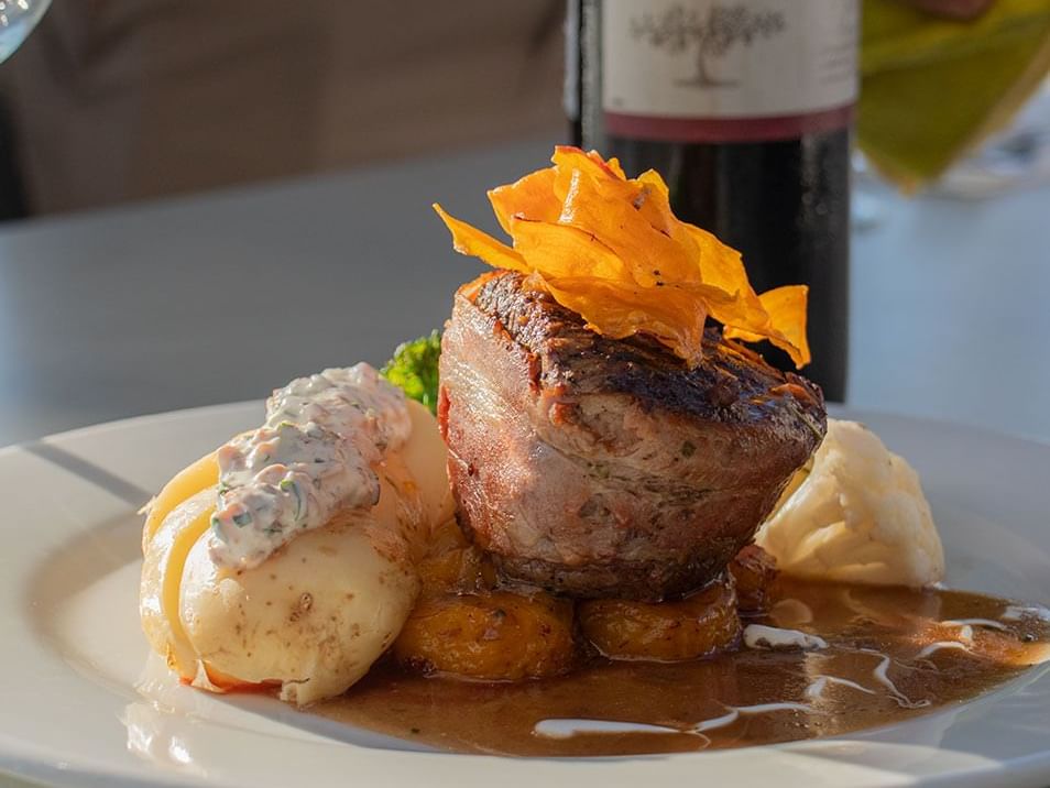 Tournedos Rossini served in restaurant, Viaggio Resort Mazatlan