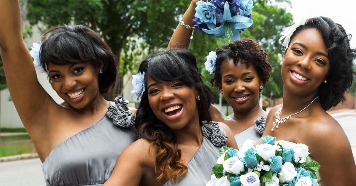 Bride and bridesmaids at Gorse Hill one of the best African wedding venues in Surrey