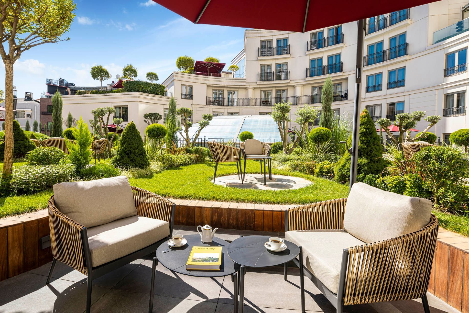 Outdoor coffee table arranged by the Two Bedroom Suite With Garden Terrace at CVK Park Bosphorus Hotel Istanbul