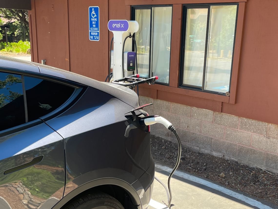 Prius charging at one of our electric vehicle stations at Sugar Pine Lodge