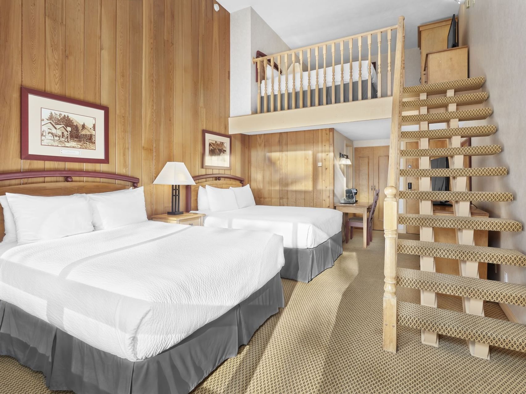 Arranged beds with staircase in Loft Room at Fairmont Hot Springs Resort