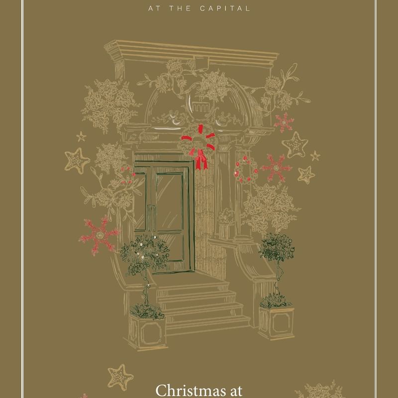 Tom Brown at the Capital Christmas card with decorated door and winter foliage.
