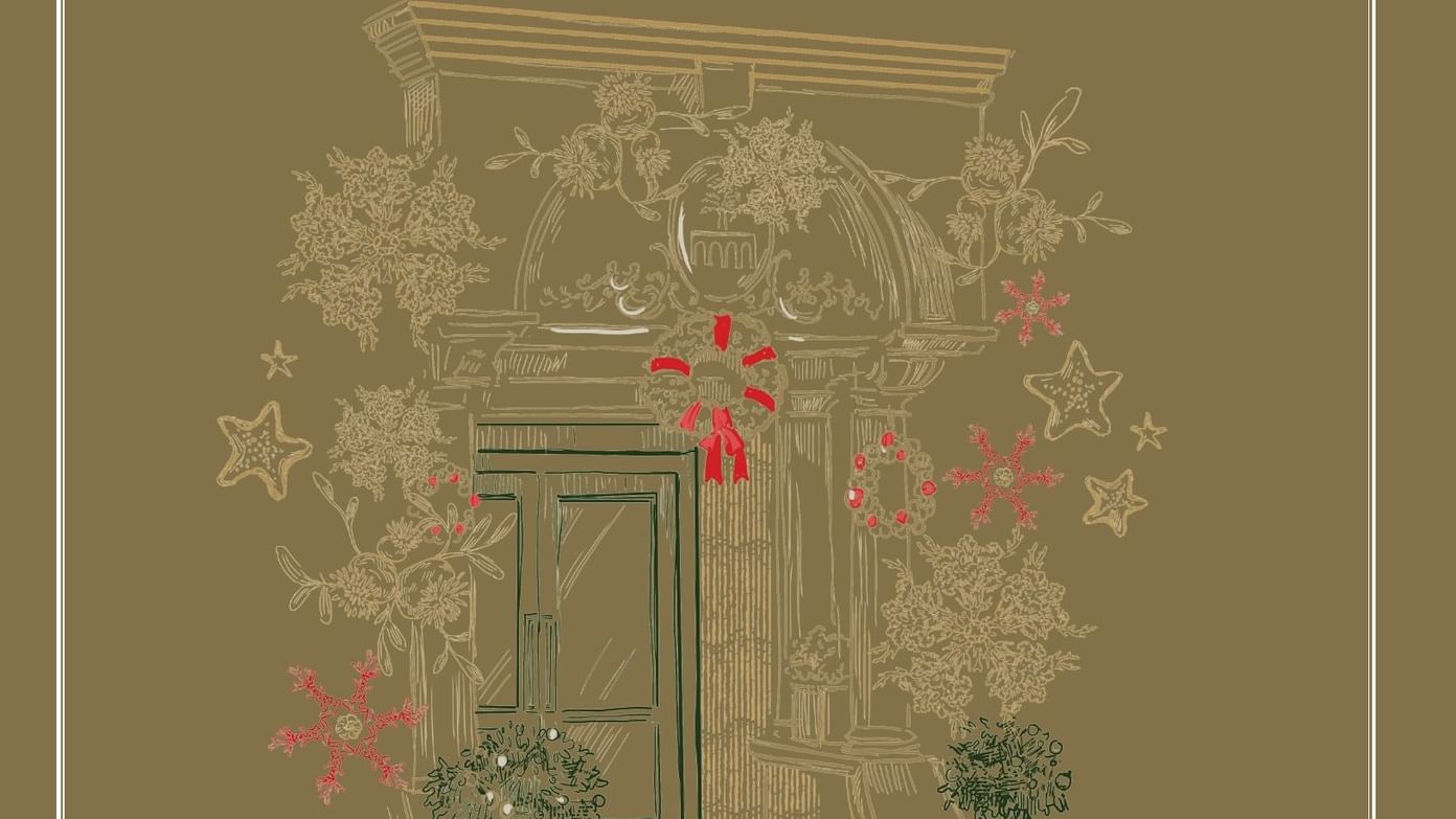 Tom Brown at the Capital Christmas card with decorated door and winter foliage.