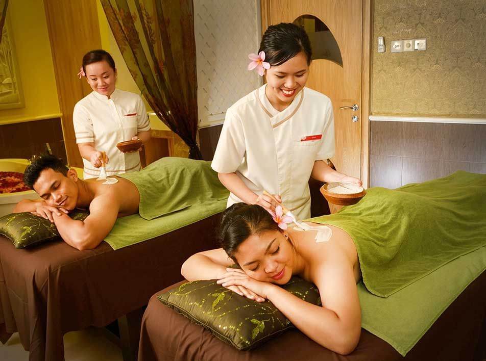 A couple enjoying a back massage at LexSpa - Grand Lexis Port Dickson