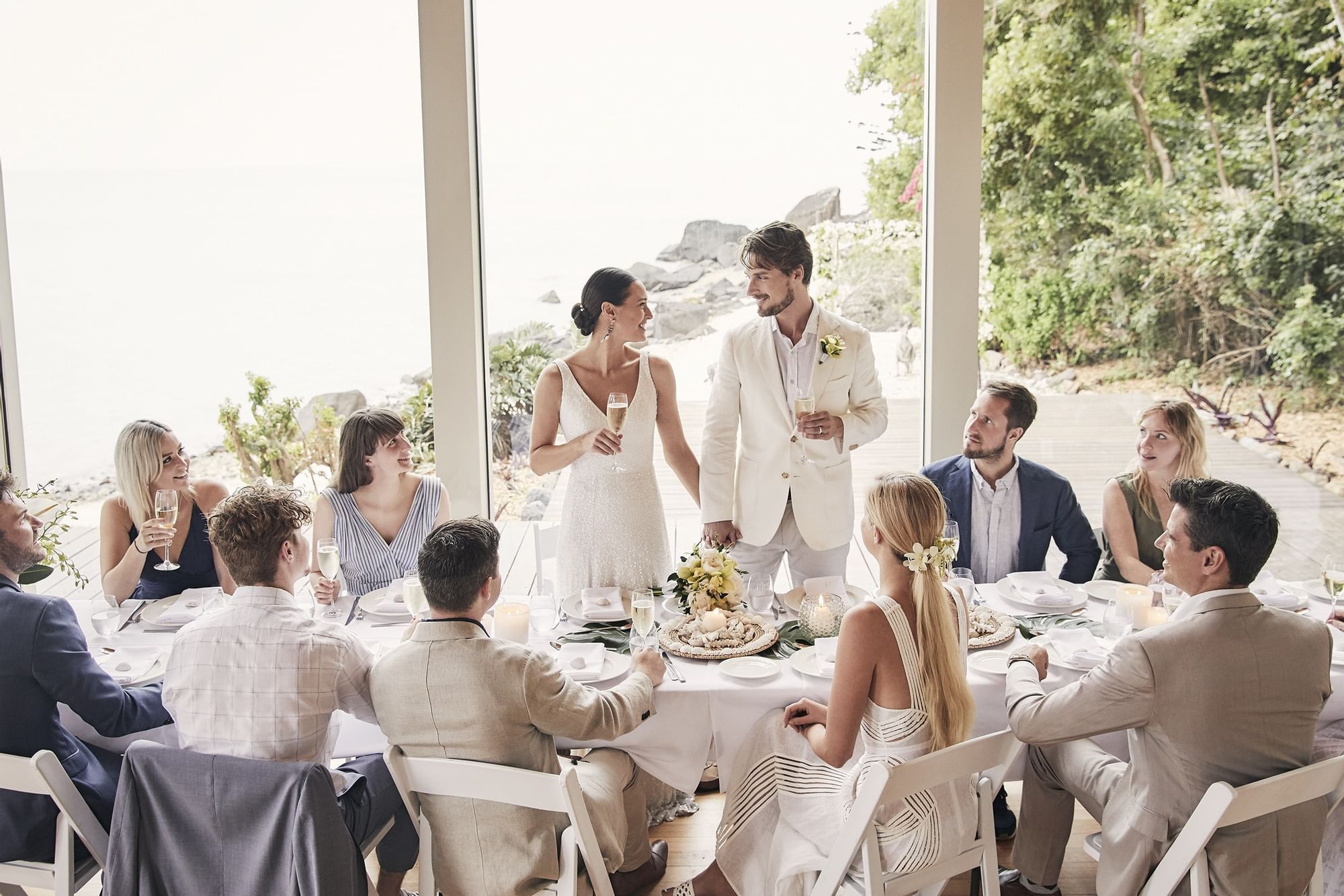 Wedded couple having a toast at Daydream Island Resort
