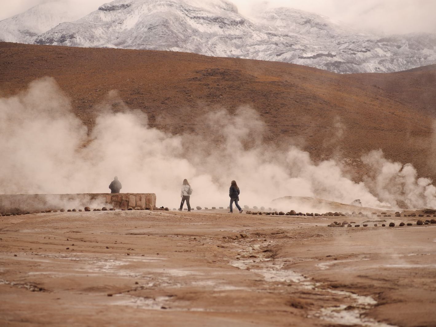 people touring in Tatio Geysers near NOI Casa Atacama hotel 
