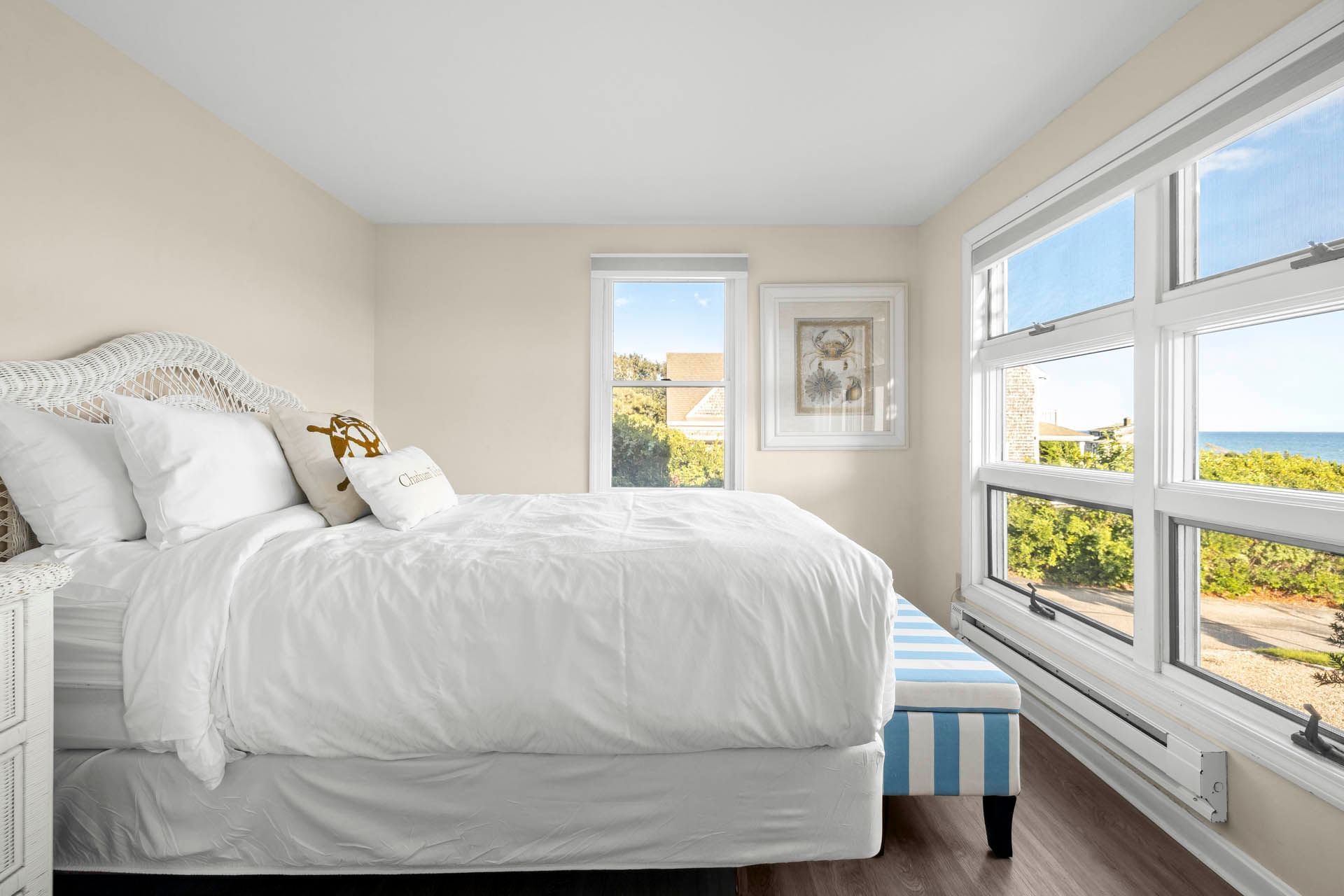 Single bed by the windows in Hightide Oceanview Three Bedroom Suite at Chatham Tides Resort