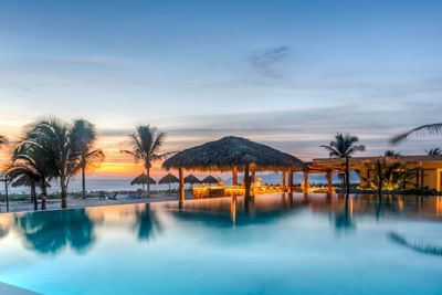 Pool bar by the pool with a sea view at Marea Beachfront Villas