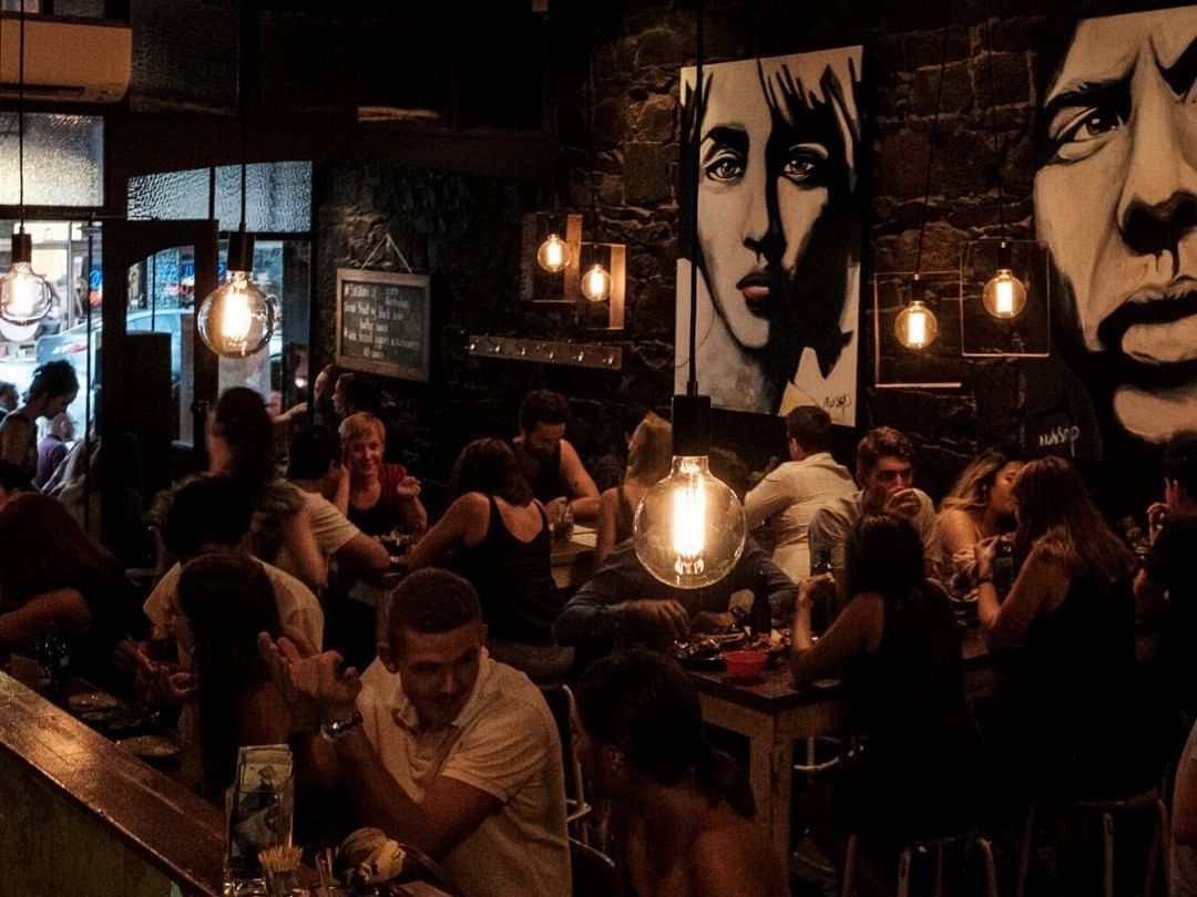 People sitting in restaurant at Brady Hardware Lane