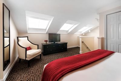 Interior of a guest room at Artmore Hotel