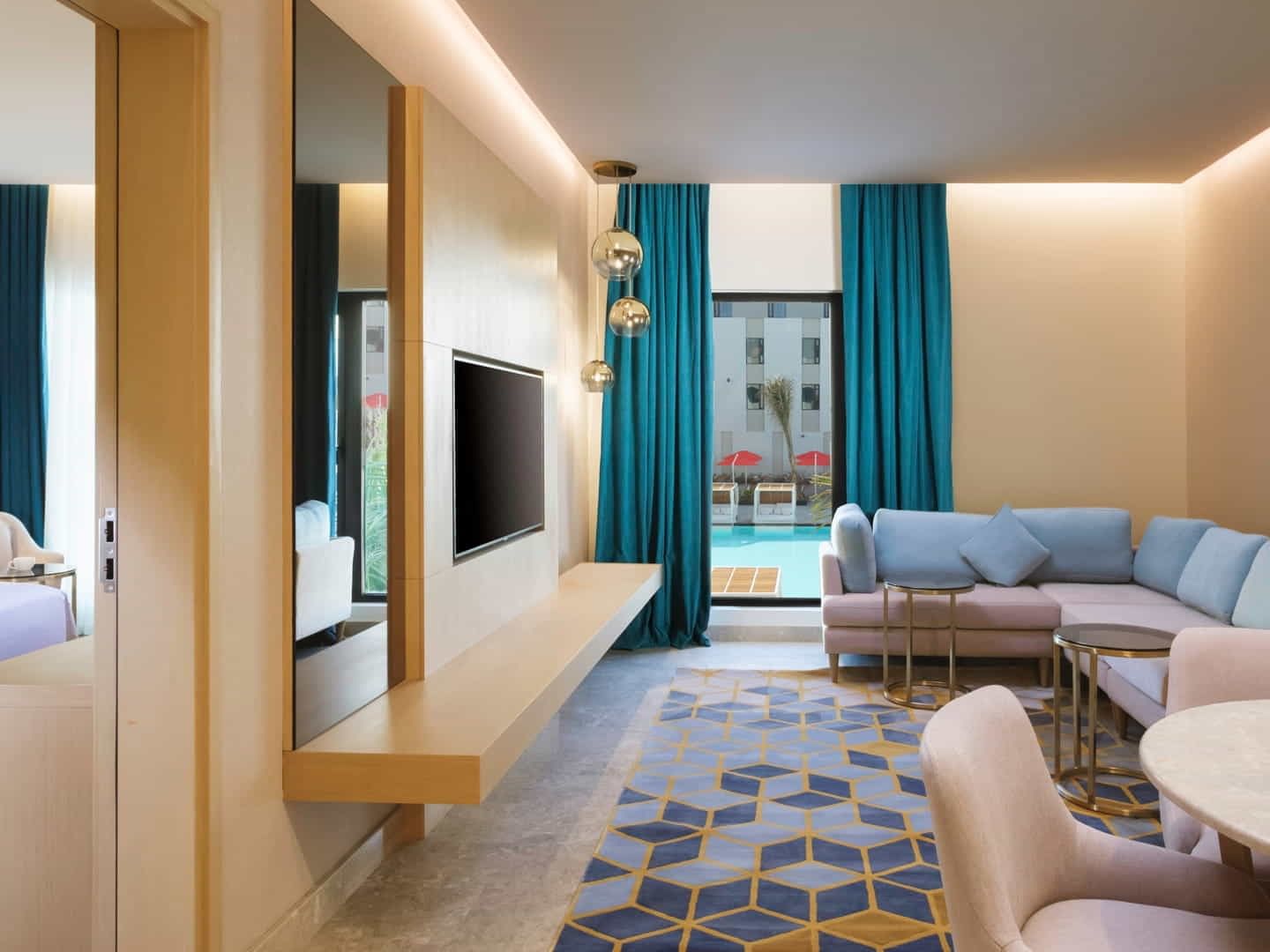 One bedroom apartment pool view at Maani Muscat Hotel & Suites