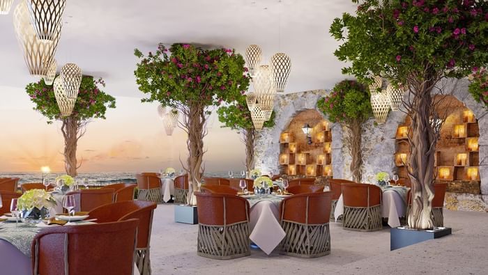 An open air dining & lounge area at  Playa Los Arcos