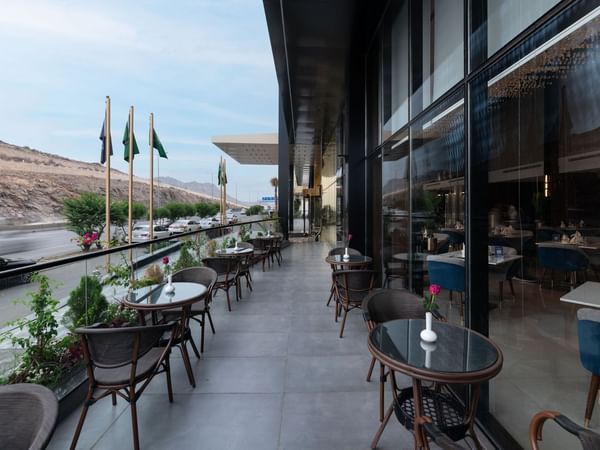 Dining area on the terrace in Sanioura Grill at Warwick Hotel Al Taif