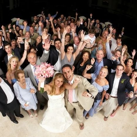 Top view of a wedding group photo at The Somerset on Grace Bay