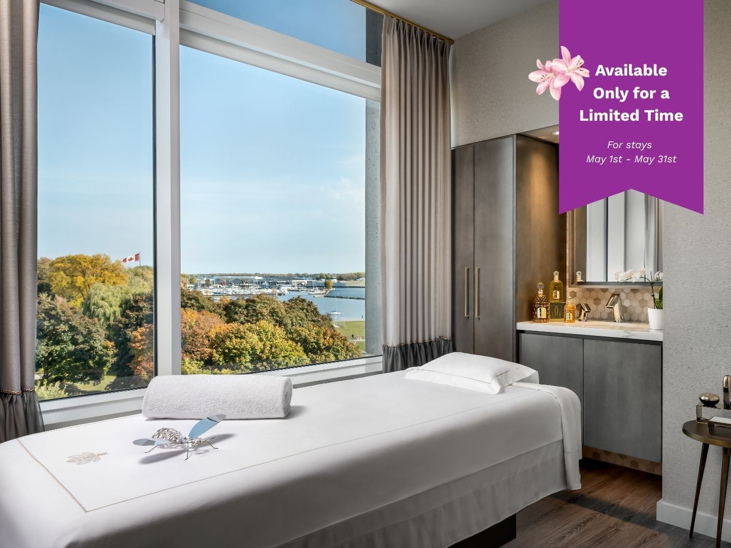 Treatment room in Guerlain Spa with a view of the city skyline and lake
