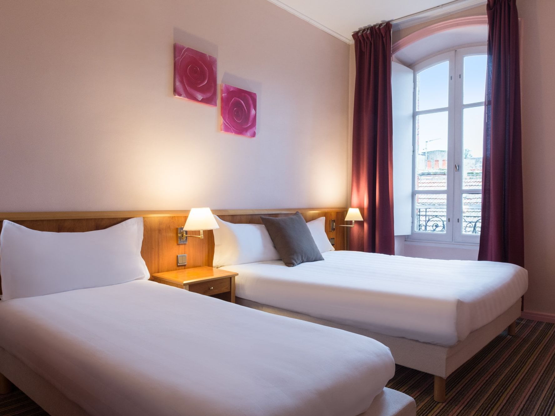 The Superior Family Room at the Grand Hôtel Saint-Pierre with one large double bed and one single bed
