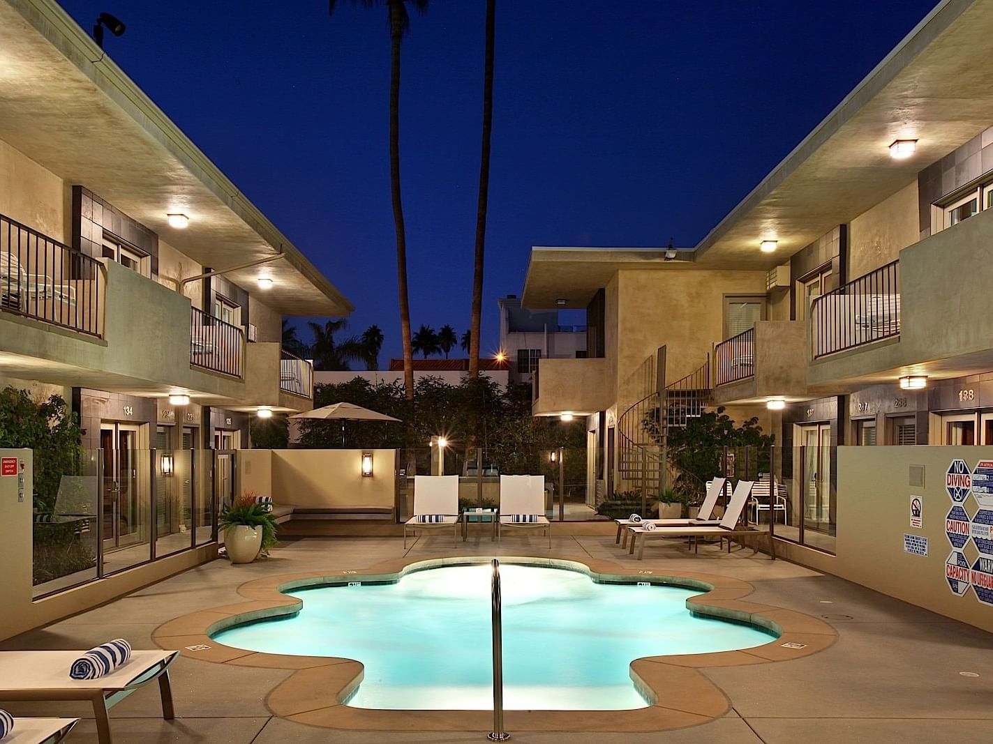 Exterior view of the outdoor pool at 7 Springs Inn & Suites