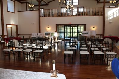 Meeting room with lines of chairs.