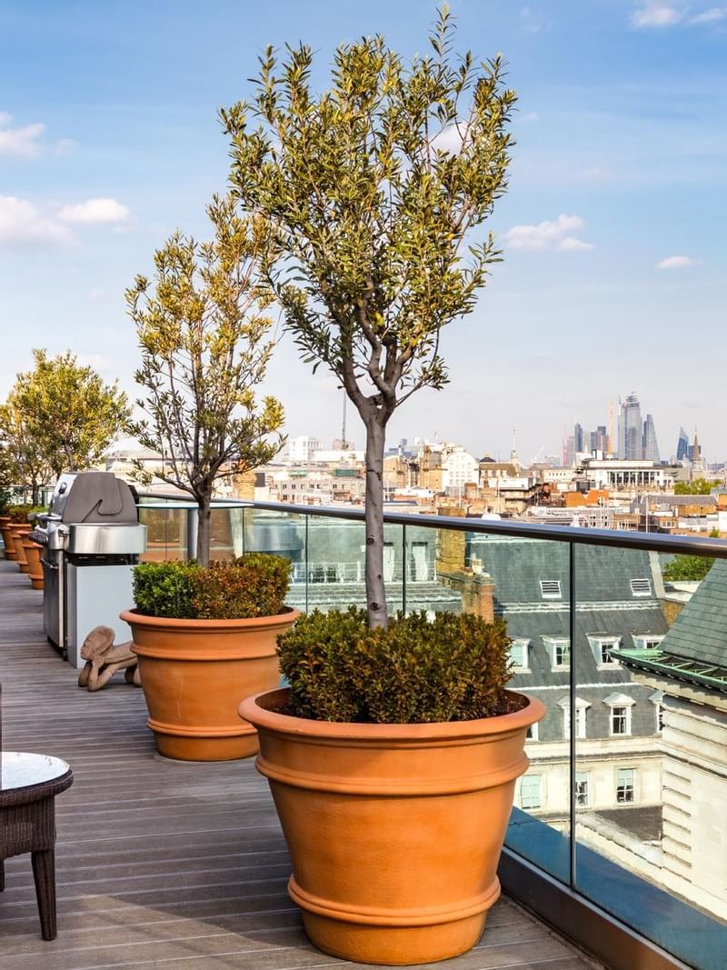 A balcony with city view at The May Fair Hotel London