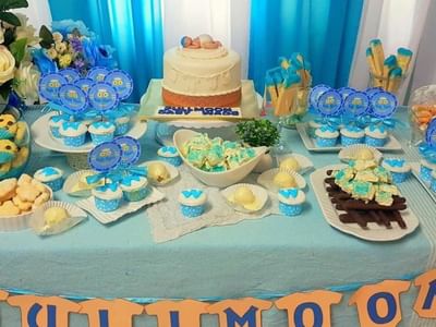 Image 136: Table with blue-themed sweets & cake for full moon celebration at Sunway Hotel Georgetown