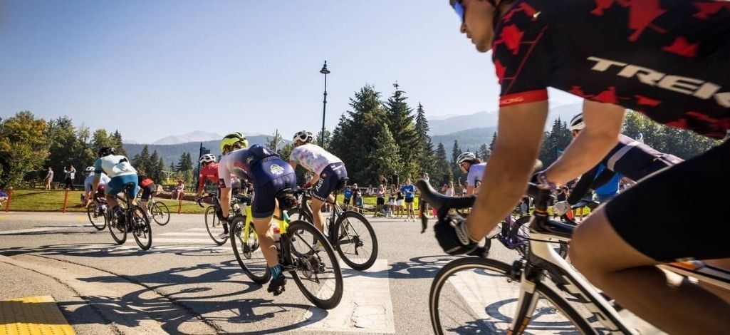 a group of people riding bikes