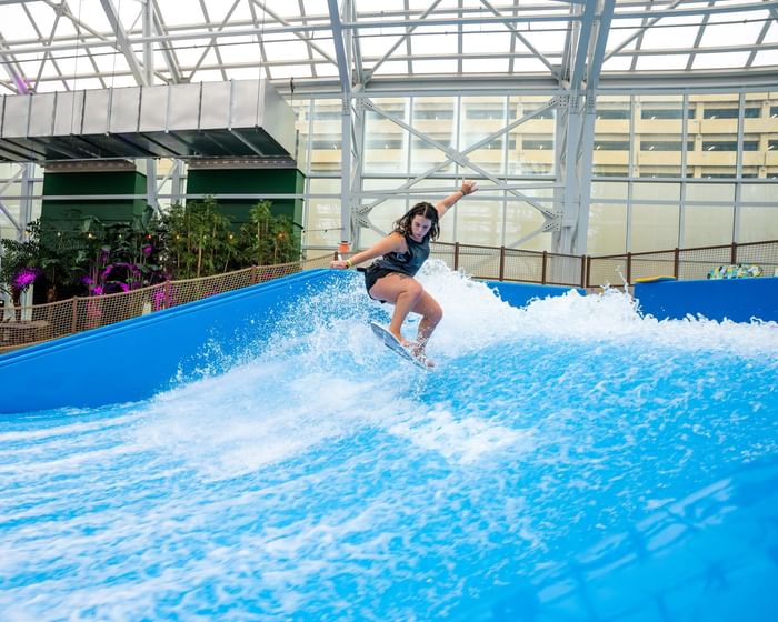 Woman flow riding in a pool at Island Waterpark at Showboat