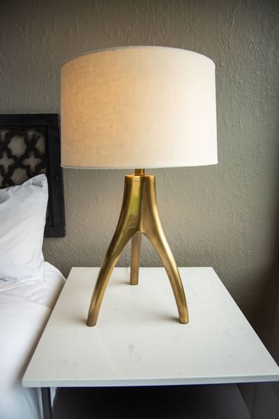 a lap on a nightstand