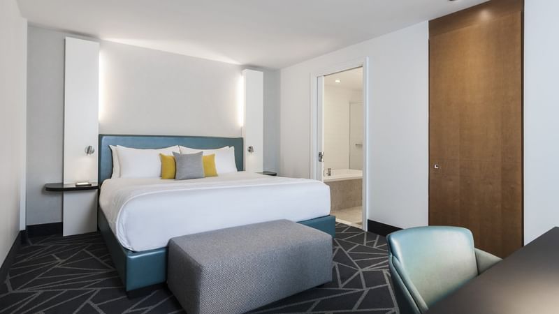 Large bed with work area in Penthouse Suite Crescent at Warwick Le Crystal