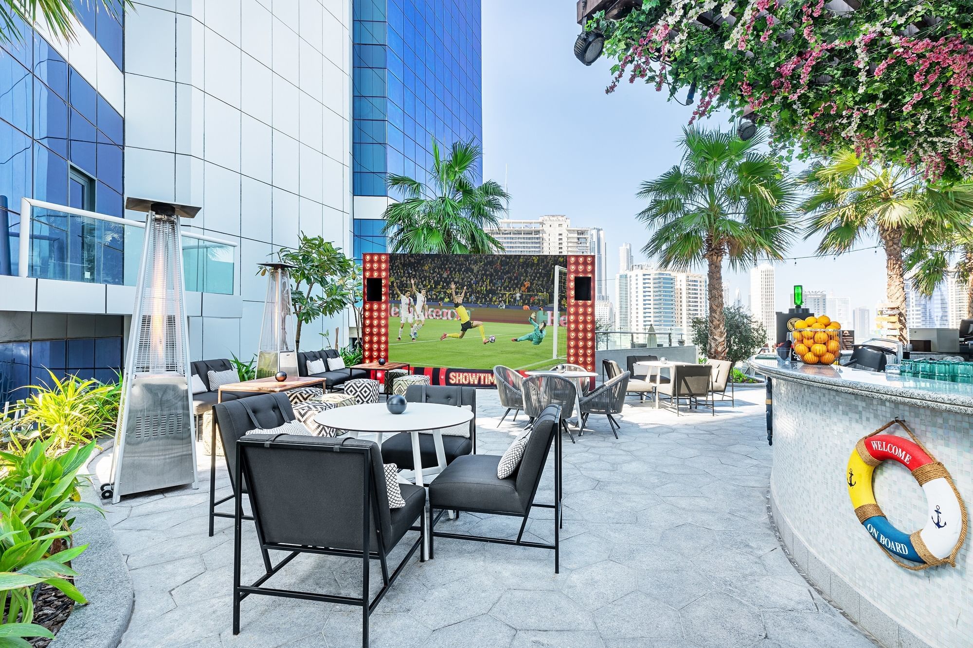 Open air dining area in Malibu Deck, Pool bar at Paramount Hotel Dubai