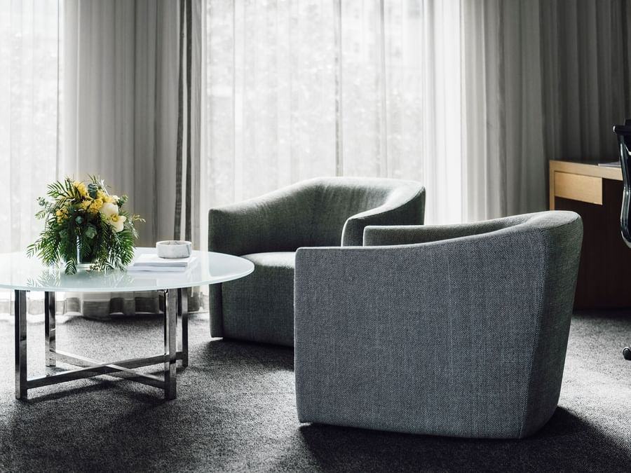 Lounge area & desk in Deluxe Room at The Como Melbourne
