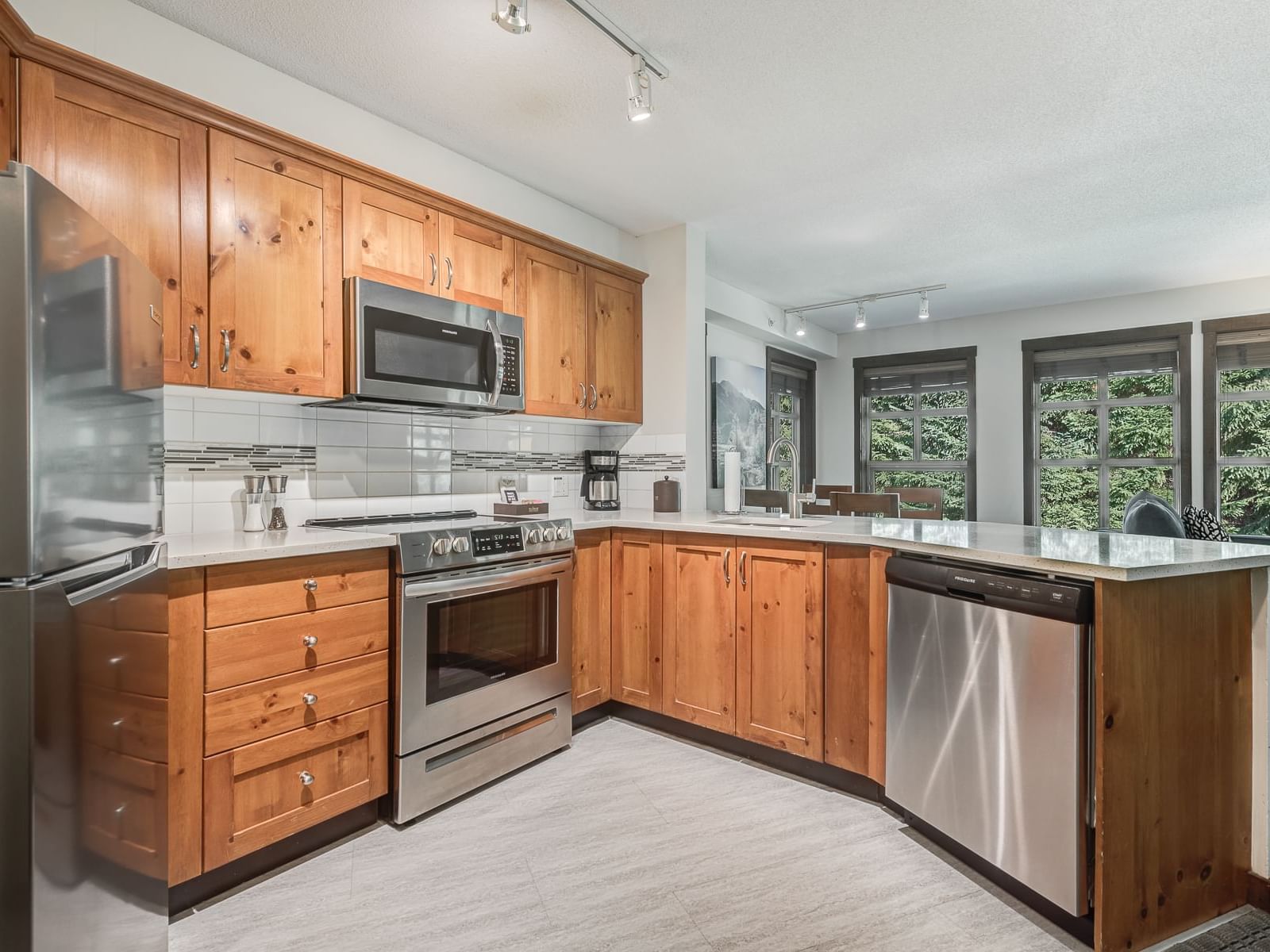 Modern kitchen equipments in Cook's Closet at Blackcomb Springs Suites