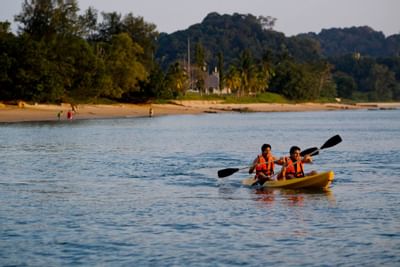 Two people on a boat ride in the beach