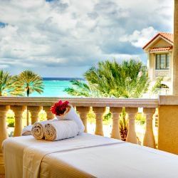 Spa bed with towels at The Somerset on Grace Bay