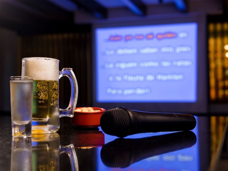 Mic, Beer & shot glass in karaoke room at FA Hotels & Resorts