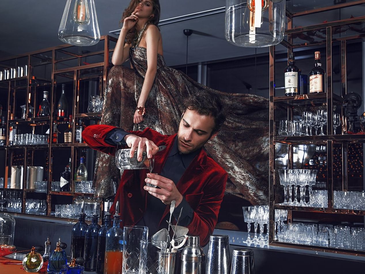 Bartender making drinks in George's Bar at Hotel Éclat Beijing