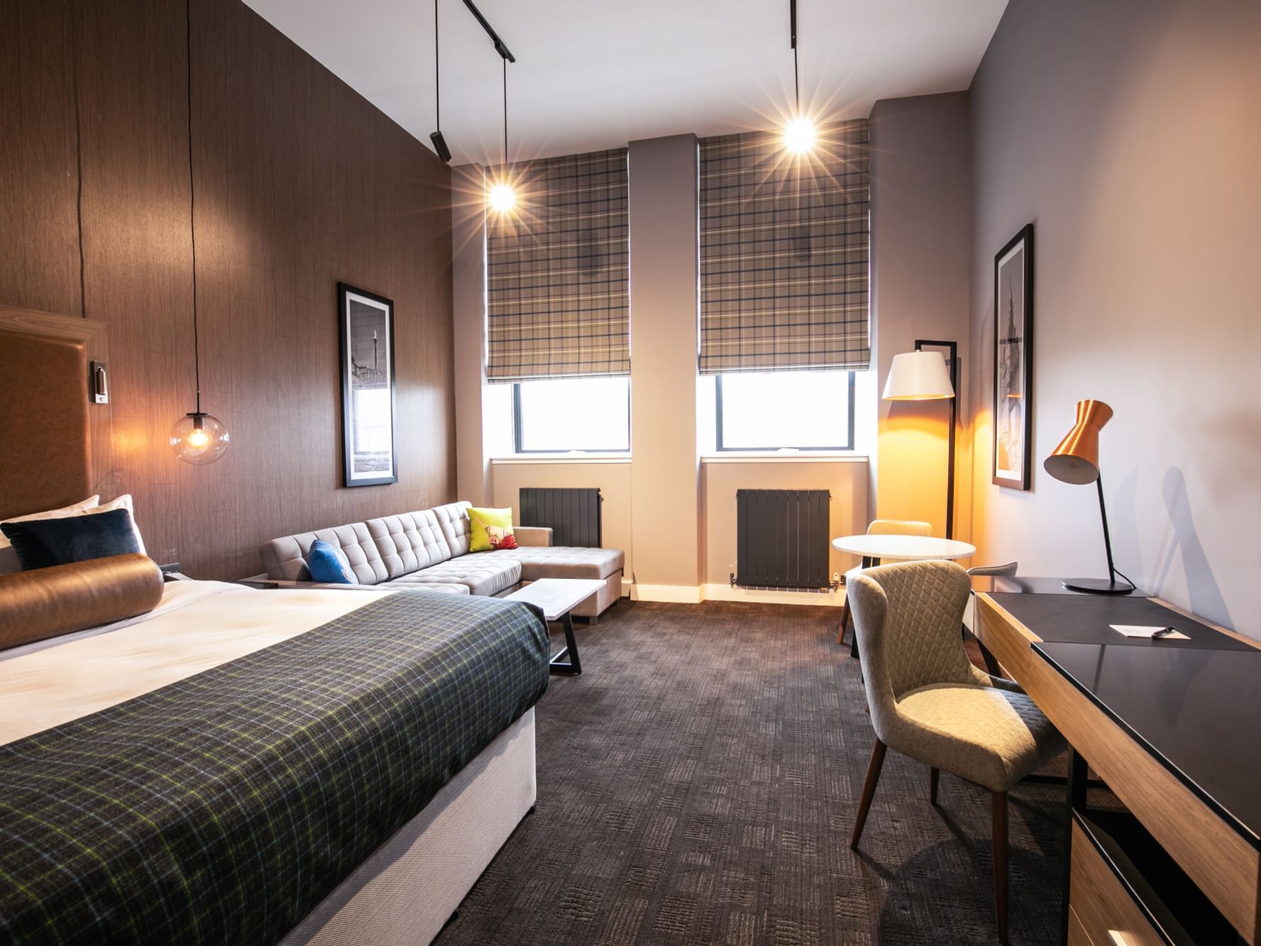 The Corporate King Room at Sandman Signature Aberdeen Hotel with one super king bed (luxury glencraft mattress) and a pull-out sofa bed on the side