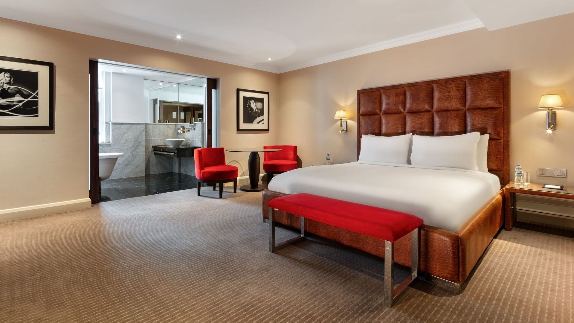 Spacious Collection Premium Room with king bed, seating area, and carpeted floors at The May Fair Hotel