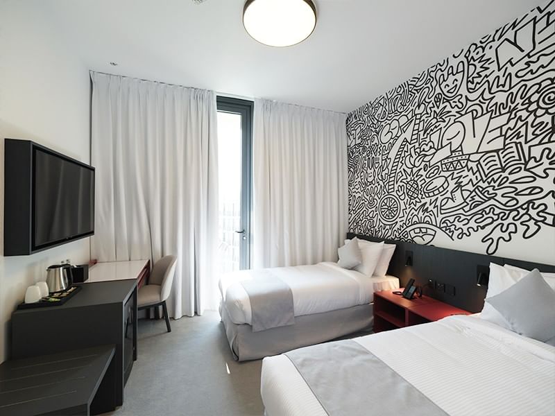 Stylish Twin Room at Nest Hotel in Sharjah, UAE