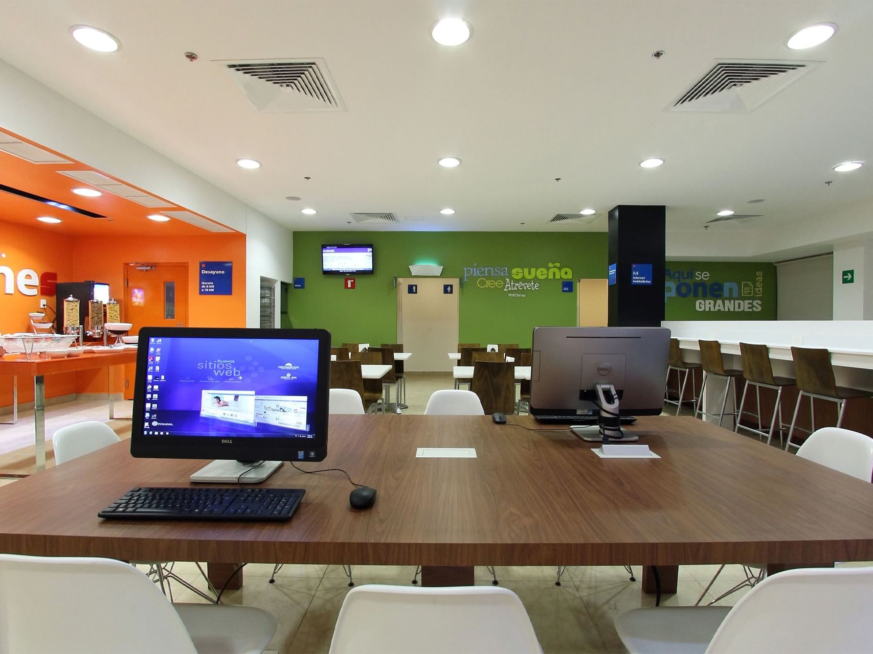 Workstation by a dining area in a business center, One Hotels