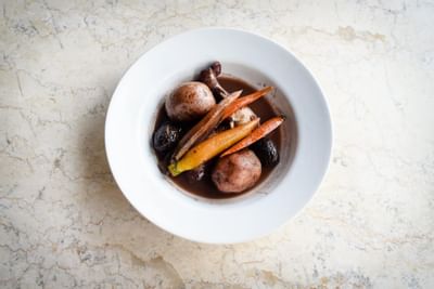 Close-up of a spicey dish served on a plate at Inn at Saratoga