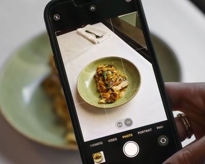 Close-up of spaghetti with prawn pasta served at SENS Hotel